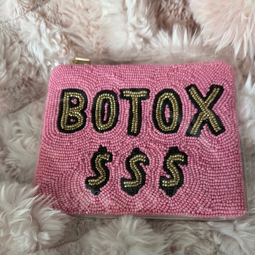 Vibrant Pink Mini Bag with Bold Black Text